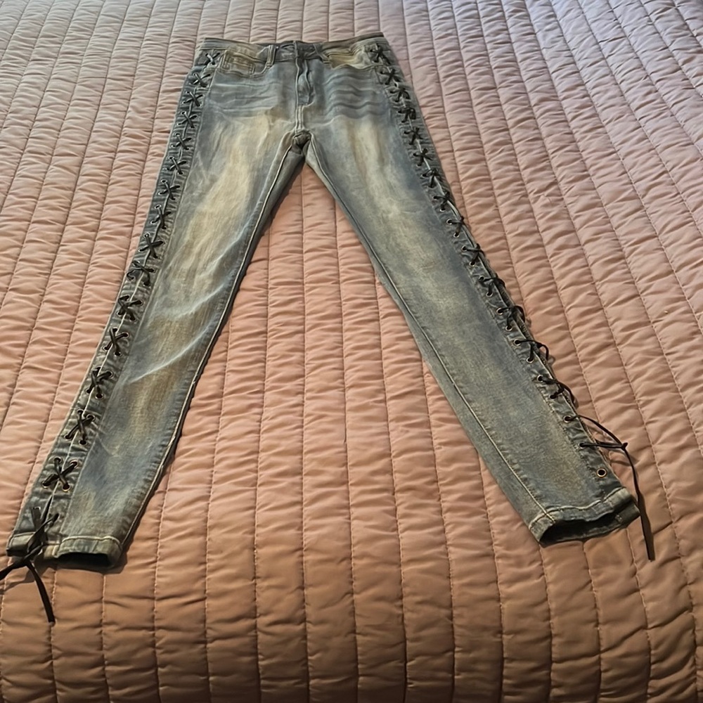 Fashion Nova lace up stretch jean.  Size 9 97% cotton, 3% spandex.